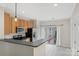 Charming kitchen with wood cabinets, a breakfast bar, and access to an outdoor balcony at 534 Donatello Ave, Charlotte, NC 28205