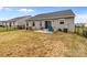 Spacious backyard with patio seating, perfect for outdoor entertaining and enjoying the view at 550 Cherry Blossom Nw Ave, Concord, NC 28027
