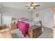 Bedroom featuring a ceiling fan, carpet floors, and natural light at 550 Cherry Blossom Nw Ave, Concord, NC 28027