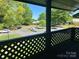 Balcony view of parking lot featuring lattice railings at 5810 Harris Grove Ln, Charlotte, NC 28212