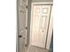 Hallway includes access to the closet and ceramic tile flooring at 5810 Harris Grove Ln, Charlotte, NC 28212