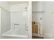 This bathroom has a tub and shower combination, along with a small storage area at 5944 Freedom Dr, Charlotte, NC 28214