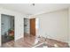 This bedroom has wood floors, a closet, and an ensuite bathroom at 5944 Freedom Dr, Charlotte, NC 28214