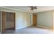 A light and bright bedroom with wood floors and bi-fold closet at 5944 Freedom Dr, Charlotte, NC 28214