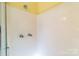 This shower features a shower head and two handles at 5944 Freedom Dr, Charlotte, NC 28214