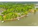 Lake Norman waterfront property featuring mature landscaping and private boat docks at 6788 Bucleigh Rd, Clover, SC 29710