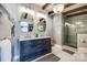 Luxurious bathroom featuring double vanity, marble countertop, and spacious glass shower at 6788 Bucleigh Rd, Clover, SC 29710