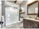Updated bathroom featuring a white walk-in shower, vanity, and decorative shelving and decor at 6788 Bucleigh Rd, Clover, SC 29710