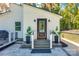 Charming home featuring a welcoming front entrance with stone steps and manicured landscaping at 6788 Bucleigh Rd, Clover, SC 29710