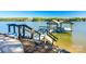 Scenic view of a lake with docks, walkways, and stairs from the shore, ideal for water activities at 6788 Bucleigh Rd, Clover, SC 29710