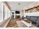 Comfortable living room with a large sectional sofa, stylish decor, and ample natural light at 6788 Bucleigh Rd, Clover, SC 29710