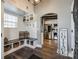 Charming mudroom with built-in bench, storage, and convenient access to the kitchen with stainless steel appliances at 6788 Bucleigh Rd, Clover, SC 29710