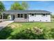 Charming one-story home with fresh, neutral paint, inviting curb appeal and a grassy lawn at 692 S Pink St, Cherryville, NC 28021