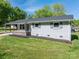 Charming one-story home with fresh, neutral paint, inviting curb appeal and a neatly maintained lawn at 692 S Pink St, Cherryville, NC 28021