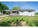 Charming one-story home with fresh, neutral paint, inviting curb appeal and a neatly maintained lawn at 692 S Pink St, Cherryville, NC 28021