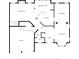 Detailed floor plan showcasing the layout of the first floor including the kitchen, living room, and garage at 7731 Harrington Woods Rd # 17, Charlotte, NC 28269
