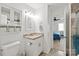 Clean bathroom with granite countertop and ample storage, with view to main bedroom at 8412 Cricket Lake Dr, Charlotte, NC 28277
