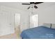 Bedroom showcasing closet and bathroom access, providing convenience and privacy at 8412 Cricket Lake Dr, Charlotte, NC 28277