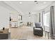 Spacious living area leads to dining area and updated kitchen at 8412 Cricket Lake Dr, Charlotte, NC 28277