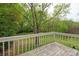 Wooden rear deck overlooking backyard, perfect for outdoor entertaining and relaxation at 8412 Cricket Lake Dr, Charlotte, NC 28277