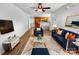 Staged living room features a plush rug, modern furnishings, and an open floor plan with kitchen views at 8829 Michaw Ct, Charlotte, NC 28269