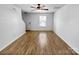 Bright living room featuring hardwood floors and lots of natural light from a window at 8829 Michaw Ct, Charlotte, NC 28269