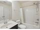 A bright bathroom featuring a toilet, shower and vanity with mirror and sink at 8923 Happiness Rd, Harrisburg, NC 28075