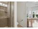 Bathroom with a stand up shower, toilet, and a view into the living space at 8923 Happiness Rd, Harrisburg, NC 28075