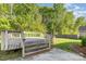 Wooden back deck with stairs leading down to the yard at 9419 Isaac Hunter Dr, Charlotte, NC 28214
