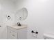 Bathroom featuring a granite countertop vanity and modern black fixtures at 1005 Clarkson St, Rock Hill, SC 29730
