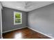 Bedroom with hardwood floors, neutral walls and a white ceiling fan at 1005 Clarkson St, Rock Hill, SC 29730
