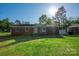 Charming single-story brick home with well-maintained lawn and mature trees at 1005 Clarkson St, Rock Hill, SC 29730