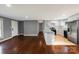 Bright, open-concept living space with modern kitchen featuring island and stainless appliances at 1005 Clarkson St, Rock Hill, SC 29730