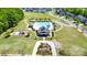 Beautiful aerial view of a pool, playground, and clubhouse in a well-maintained community at 10328 Lemington Dr, Mint Hill, NC 28227