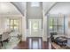 Bright foyer with high ceilings, decorative columns, and beautiful hardwood floors at 10328 Lemington Dr, Mint Hill, NC 28227