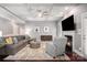 Stylish living room featuring a fireplace and hardwood floors at 10328 Lemington Dr, Mint Hill, NC 28227