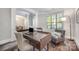 Bright office space featuring a desk, chair, and comfortable seating at 10328 Lemington Dr, Mint Hill, NC 28227