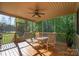 Enjoyable outdoor screened patio ideal for relaxing and entertaining with wooded view at 10328 Lemington Dr, Mint Hill, NC 28227