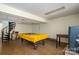 Recreational basement area with a pool table and a spiral staircase at 1058 General Hoke Dr, Lincolnton, NC 28092