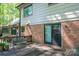A wood deck with sliding glass doors to the home's interior at 1058 General Hoke Dr, Lincolnton, NC 28092