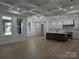 Open-concept living space with a large island kitchen and ample natural light at 110 Hunts Landing Dr, Mooresville, NC 28117