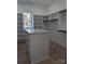 Walk-in closet features a center island and custom shelving at 110 Hunts Landing Dr, Mooresville, NC 28117