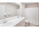 Clean and bright bathroom featuring a double sink vanity and shower with colorful decor at 11215 Dappled Light Trl, Charlotte, NC 28227