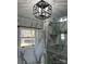 Bathroom featuring a glass-door shower and elegant marble wall tile at 1148 Marietta St, Charlotte, NC 28214