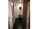 Hallway featuring hardwood floors and sliding closet doors at 1148 Marietta St, Charlotte, NC 28214