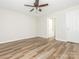 Cozy bedroom featuring wood floors and access to the bathroom and closet at 1203 Maple Shade Ln, Charlotte, NC 28270