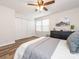 Bedroom showing large closet space, natural light, and wood-look flooring at 1203 Maple Shade Ln, Charlotte, NC 28270