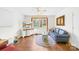 Bright living room features hardwood floors, a comfortable sofa, and a large window at 1204 Meadowood Dr, Shelby, NC 28150