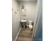 Charming powder room with pedestal sink, and wood-look flooring at 131 Mays Ct, Rock Hill, SC 29730