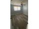 Comfortable bedroom with wood-look flooring, ceiling fan, and bright window at 131 Mays Ct, Rock Hill, SC 29730